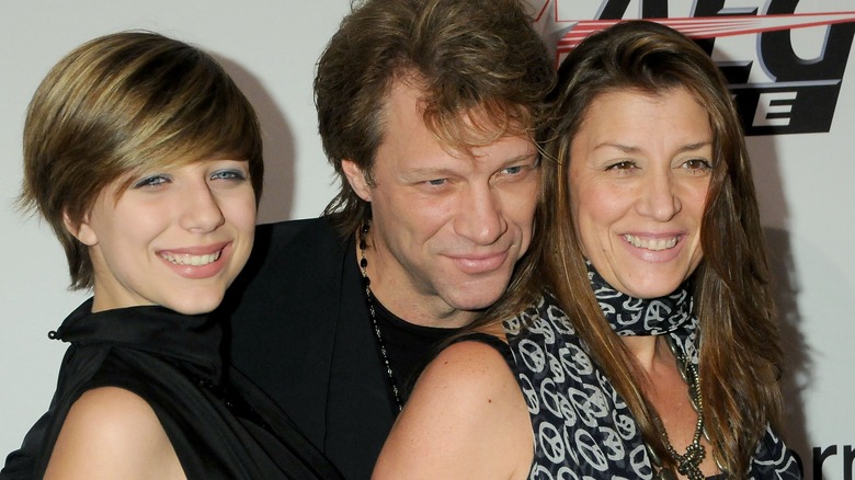 Stephanie Bongiovi smiles with parents