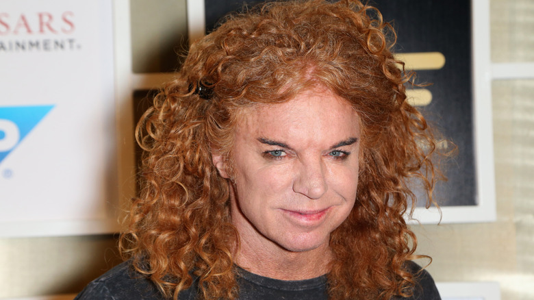 Carrot Top tight lipped smiling