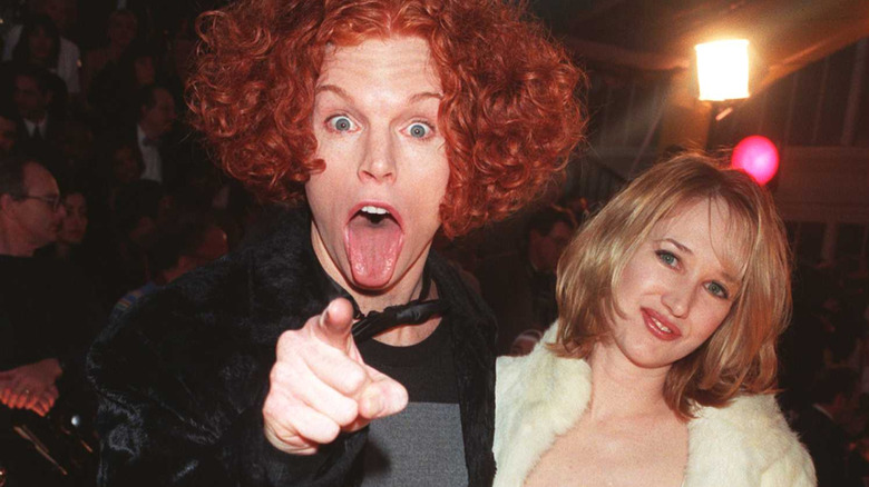 Carrot Top points to camera at red carpet event