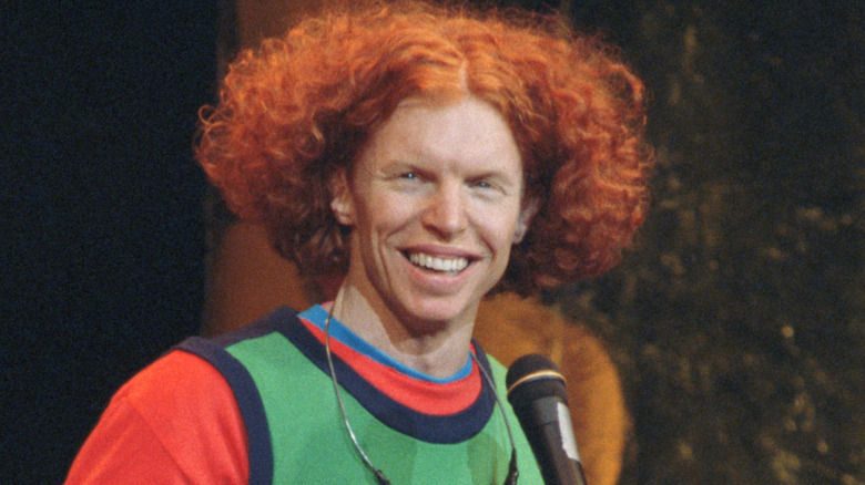 Carrot Top smiling in mid-90s standup gig