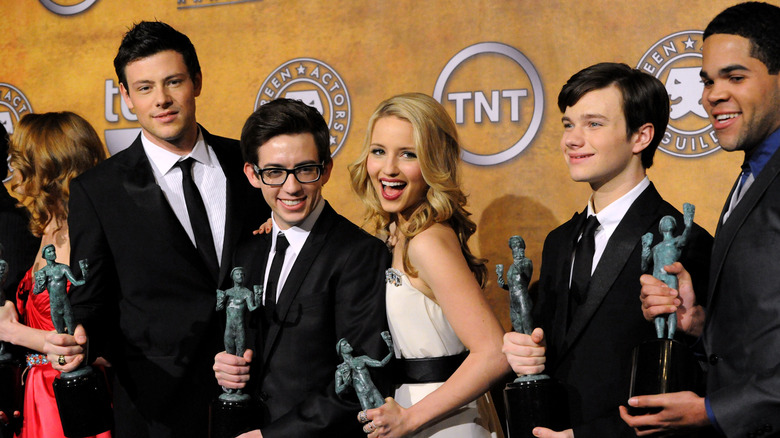 Cory Monteith with cast of Glee at an awards event