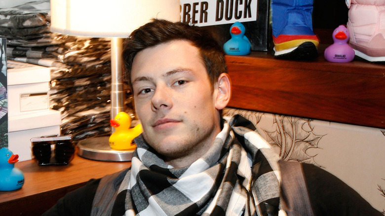 Cory Monteith wearing a checked scarf