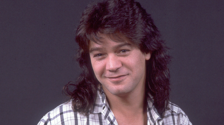 eddie van halen smirking plaid shirt