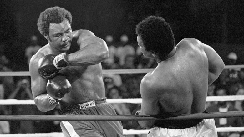 George Foreman fighting Muhammad Ali at the Rumble in the Jungle