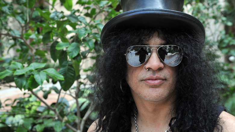 Slash sunglasses hat outside portrait