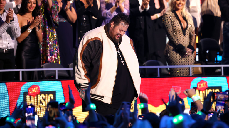 Jelly Roll on stage in front of a crowd