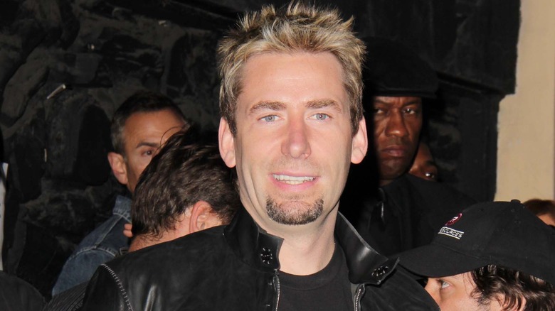 chad kroeger in a crowd smiling goatee