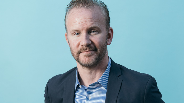 Morgan Spurlock blue background