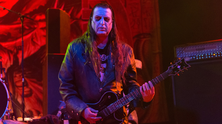 Dez Cadena playing guitar on stage with the Misfits in 2014