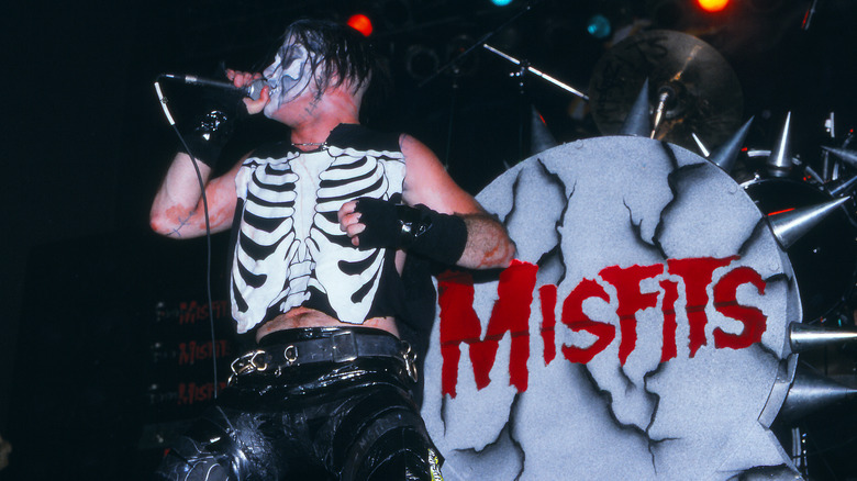 Michale Graves singing on stage with the Misfits in 1996