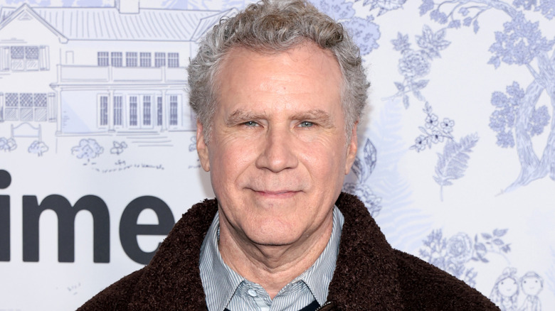 Will Ferrell smiling weakly into camera