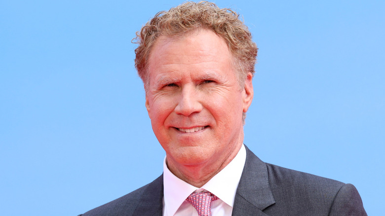 Will Ferrell squinting in suit