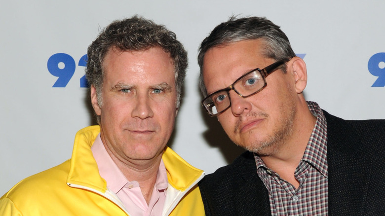 Will Ferrell and Adam McKay holding heads close together