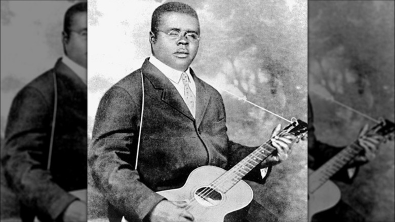 Blind Lemon Jefferson with guitar