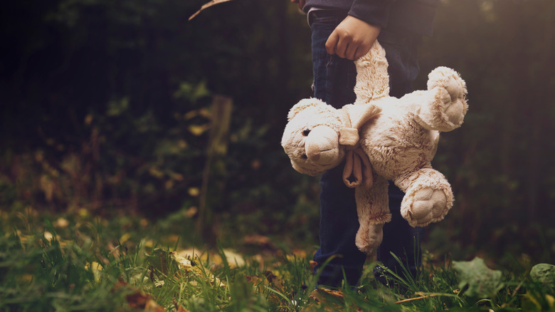 Boy with teddy bear