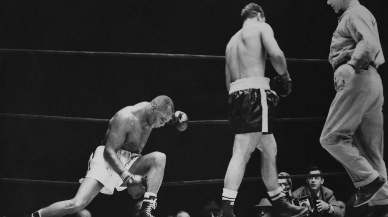 Rocky Marciano defeats Jersey Joe Walcott 