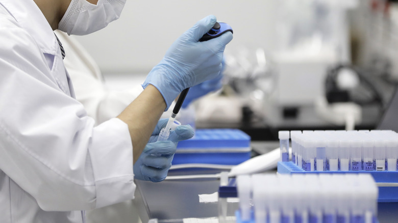 Scientist with DNA tests