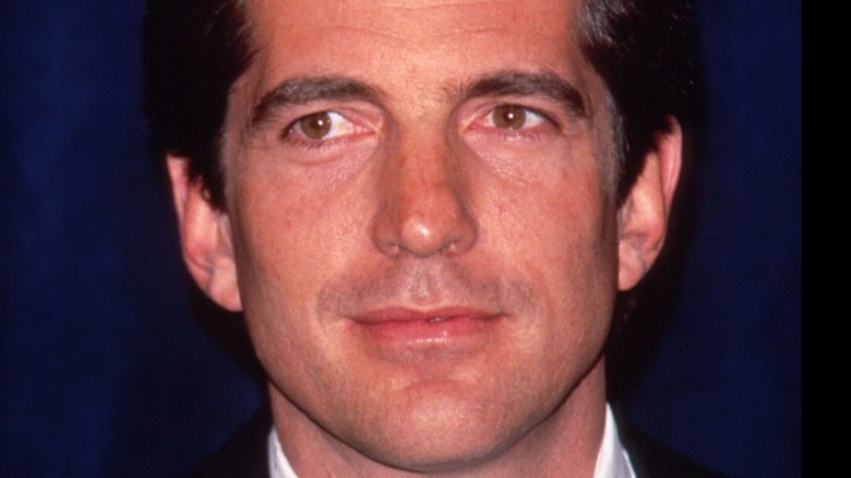 John F. Kennedy Jr. smiling