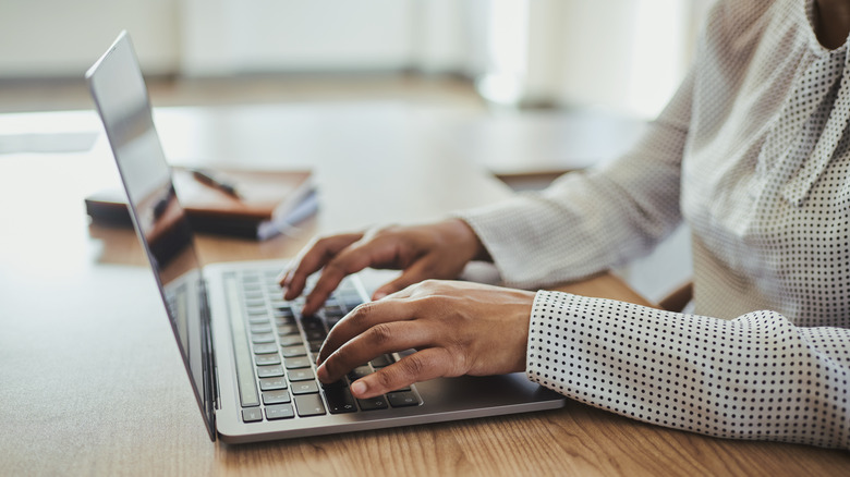 woman using computer