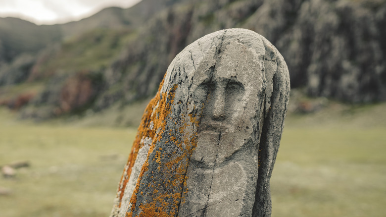 Scythian stone carving of face