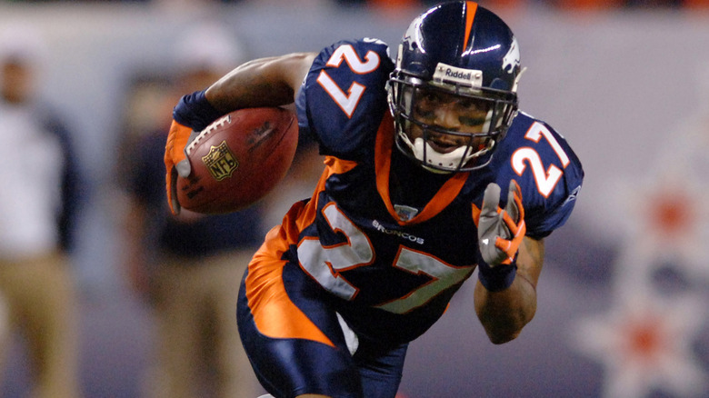Darrent Williams running with football