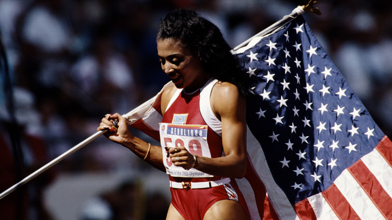 Florence Griffith Joyner carrying U.S. flag