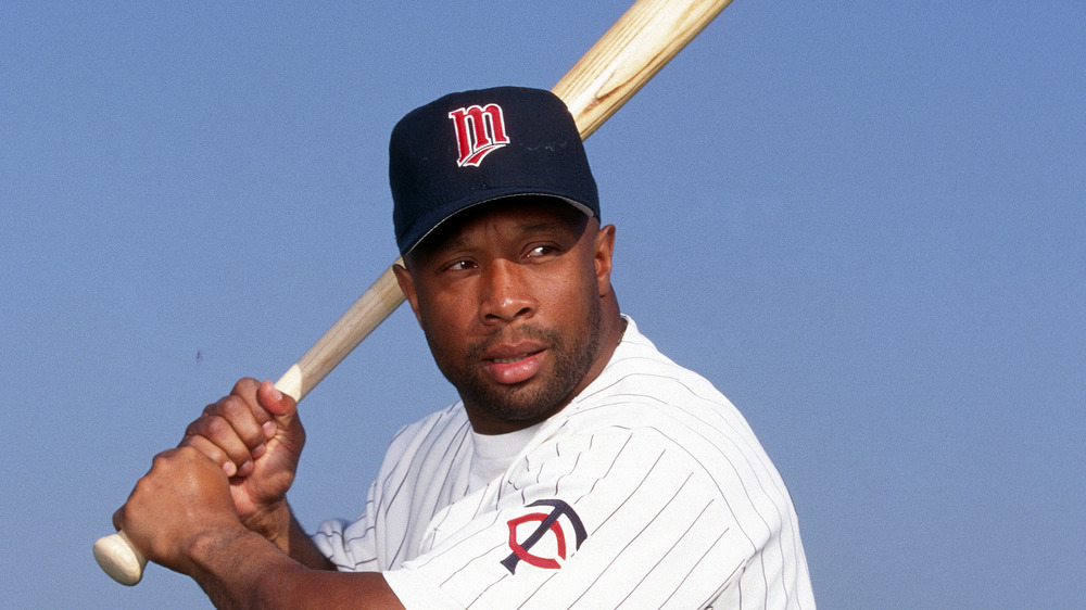 Kirby Puckett holding a bat