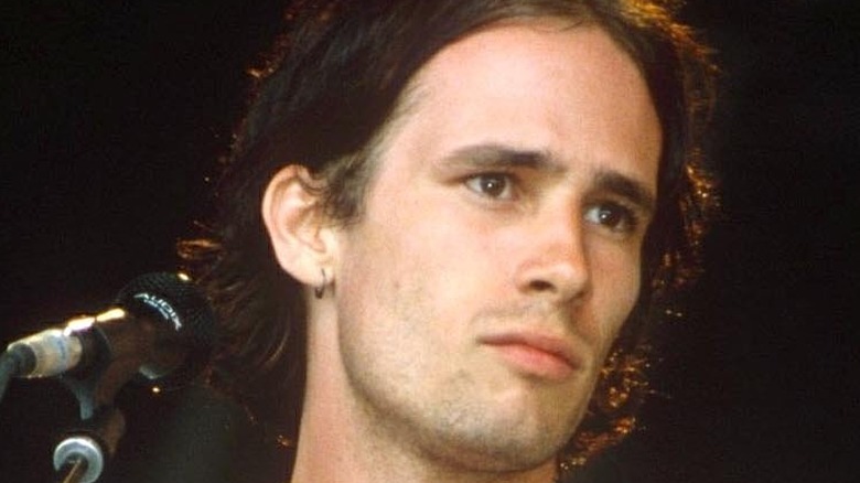 Jeff Buckley singing into microphone