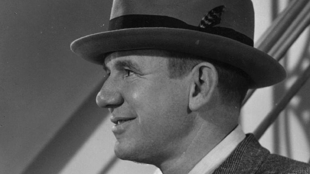 Ted Healy wears a hat
