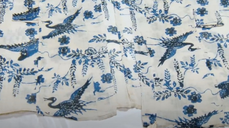 Intricately detailed ton-byan fabric, made only on Okinawa