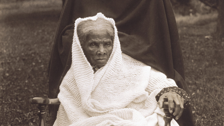 Harriet Tubman seated and wrapped in a white shawl in 1911