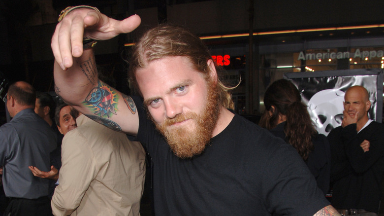 Ryan Dunn with hand up