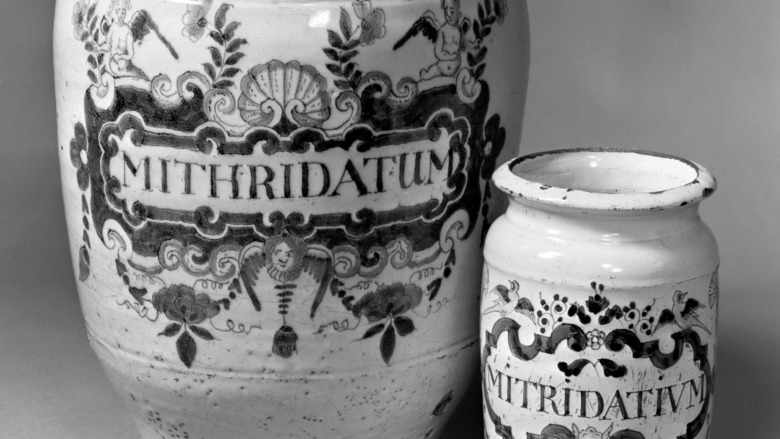 Etched drug jars baring antidote name