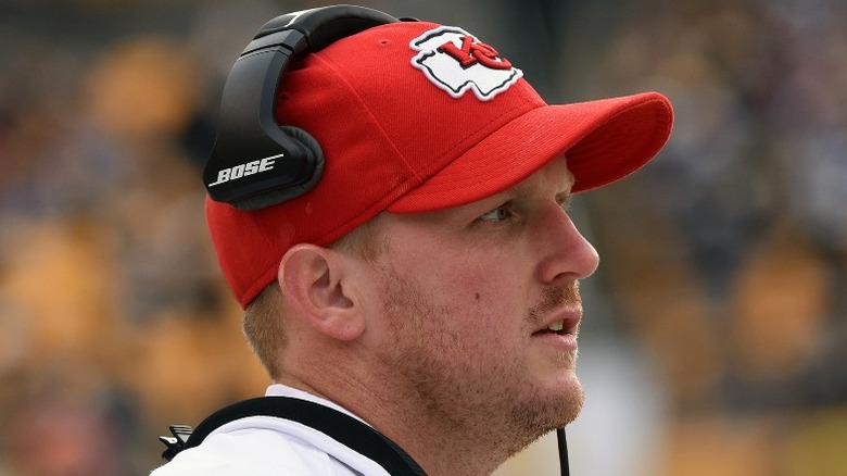 Britt Reid red hat headphones