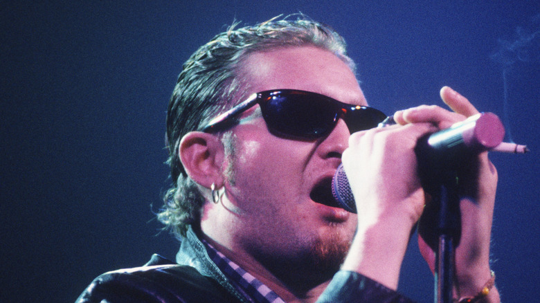 Layne Staley in sunglasses singing and smoking