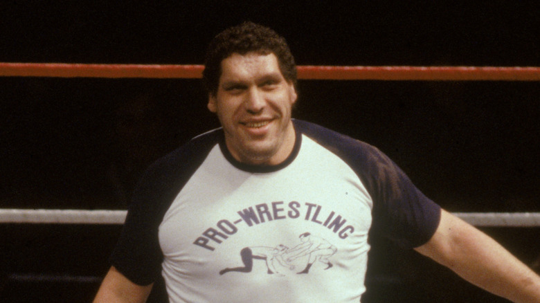 andre the giant smiling in ring in t-shirt