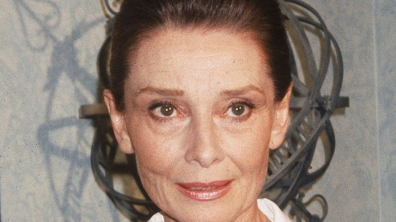 Audrey Hepburn looking a little sad, but still smiling