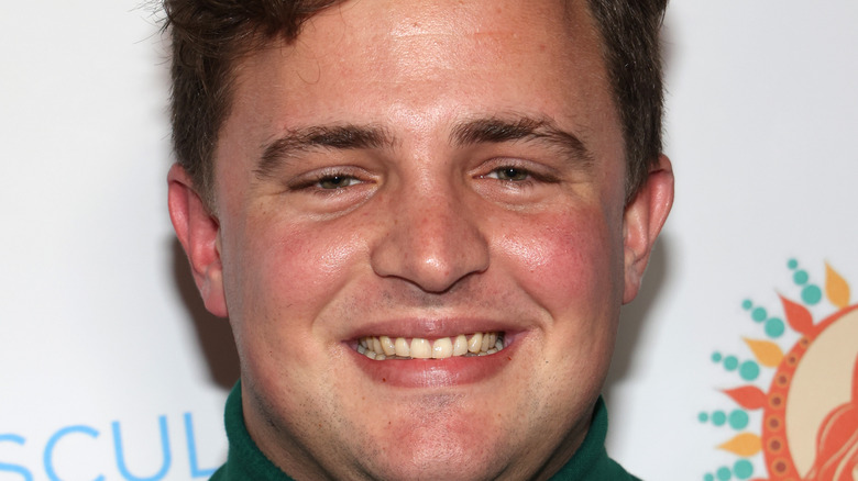 James Duke Mason smiles