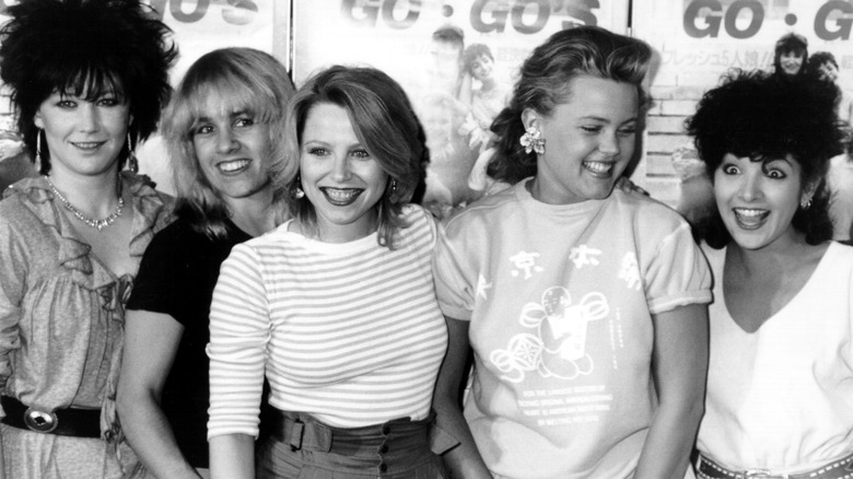 The Go-Go's smiling for photographers