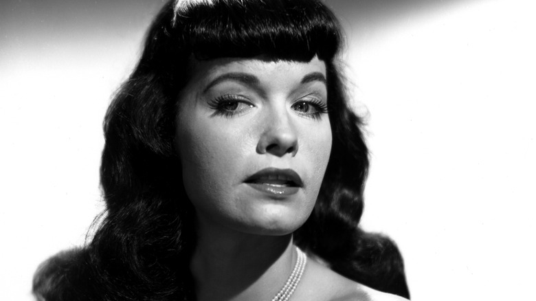 Bettie Page poses for a portrait