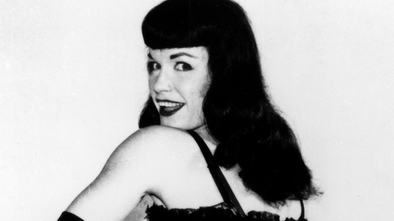 Bettie Page poses in lingerie