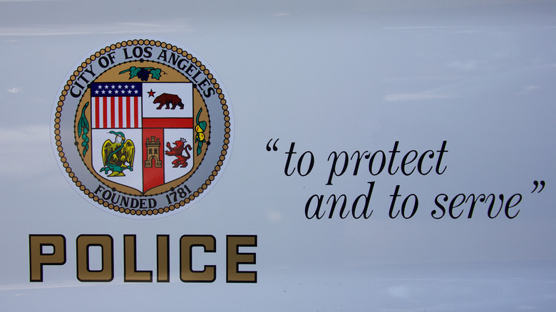 LAPD car door with motto