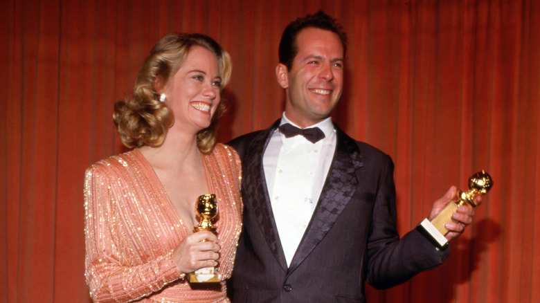 Bruce Willis with Cybill Shepherd at Emmy awards for show Moonlighting