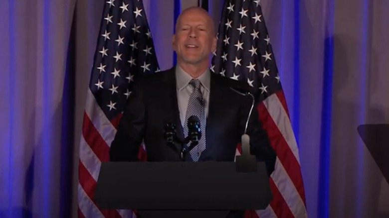 Bruce Willis giving a speech