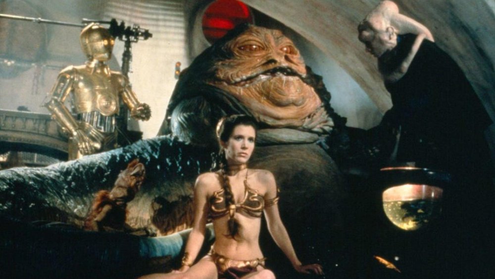 Carrie Fisher as Princess Leia, Anthony Daniels as C-3PO, Michael Carter as Bib Fortuna and Jabba the Hutt in Return of the Jedi