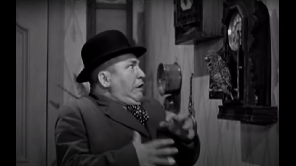 Curly meets a clock