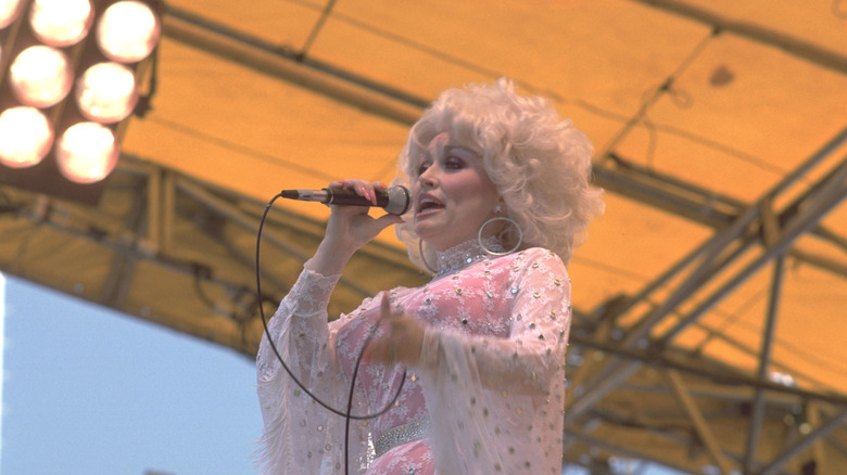 Dolly Parton performs on stage