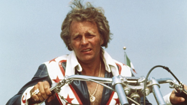 Evel Knievel astride his Harley Davidson motorcycle in 1973