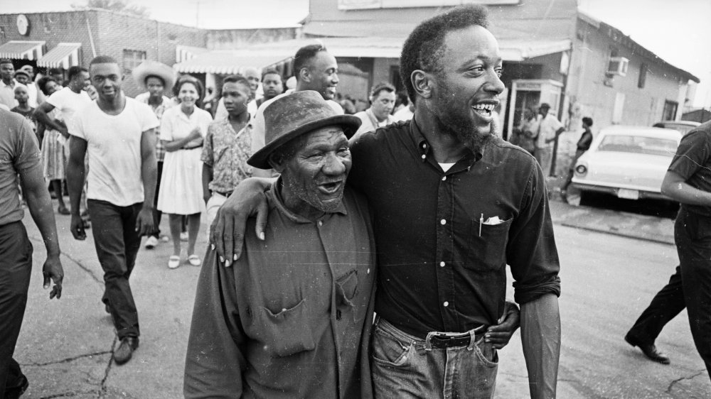 Participants on the Meredith Mississippi March near the town of Canton, June 1966. The march began with civil rights campaigner James Meredith setting out to walk from Memphis, Tennessee to Jackson, Mississippi, in order to encourage African-Americans along the way to register and vote. After Meredith was shot and wounded, other civil rights campaigners continued the march in his name.