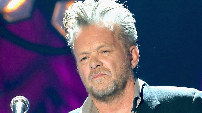 John Mellencamp sneering